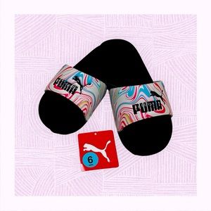 Puma Slides. Brand New! Tags still on! Size 6.